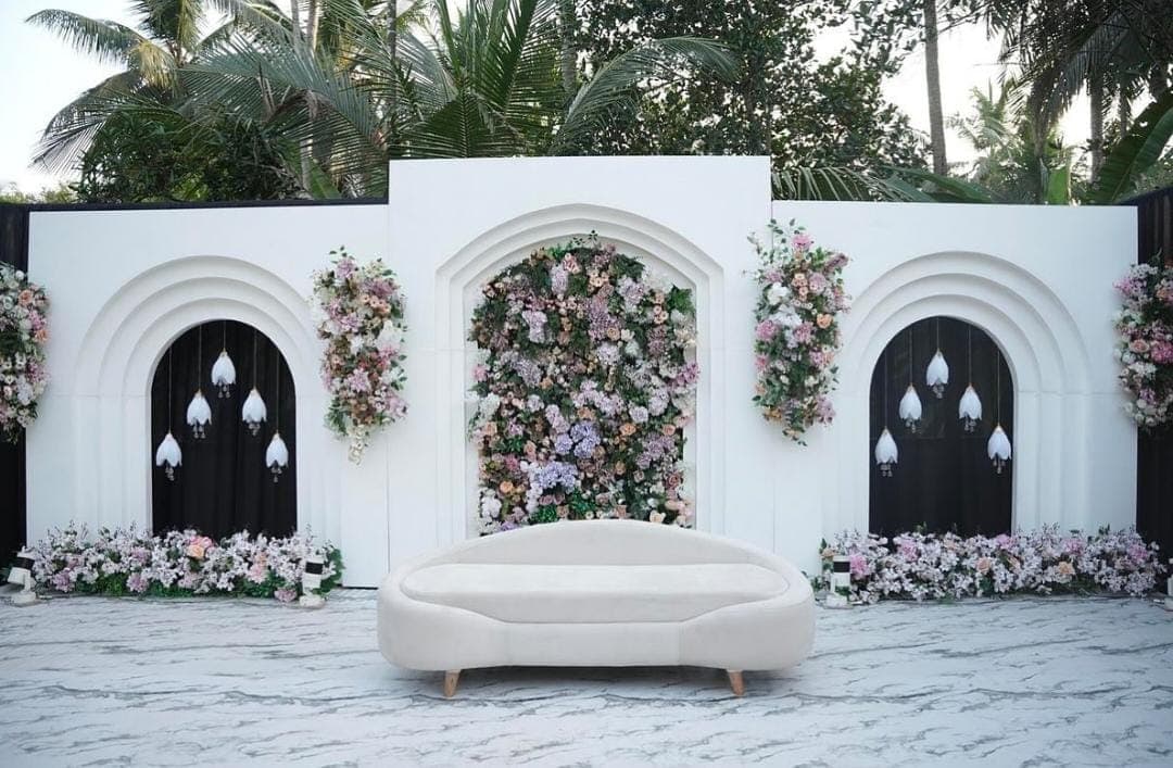 White arch floral wall wedding decoration Kerala