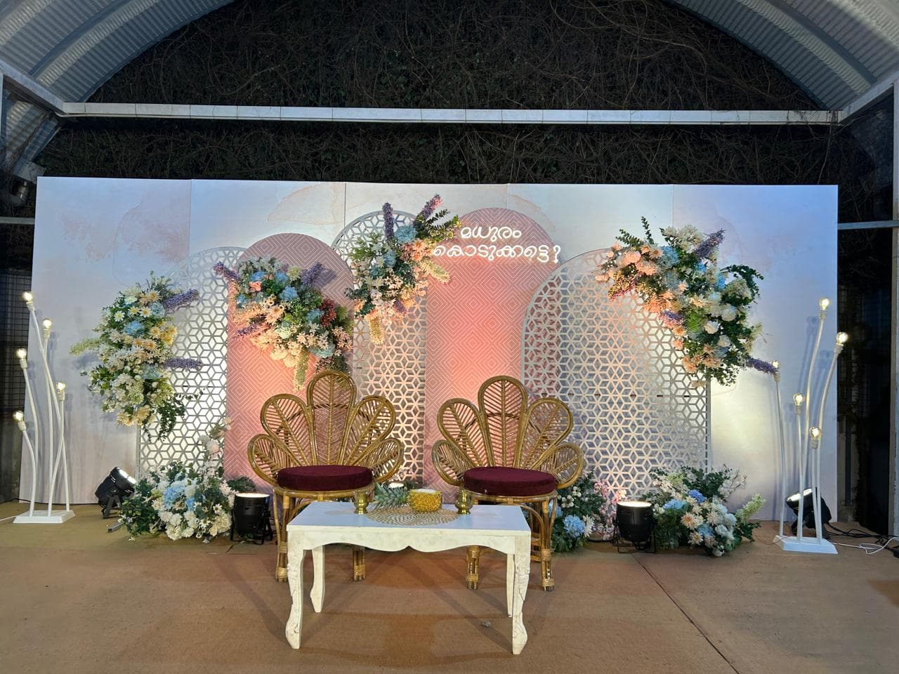 Floral arch engagement stage setup in Kerala